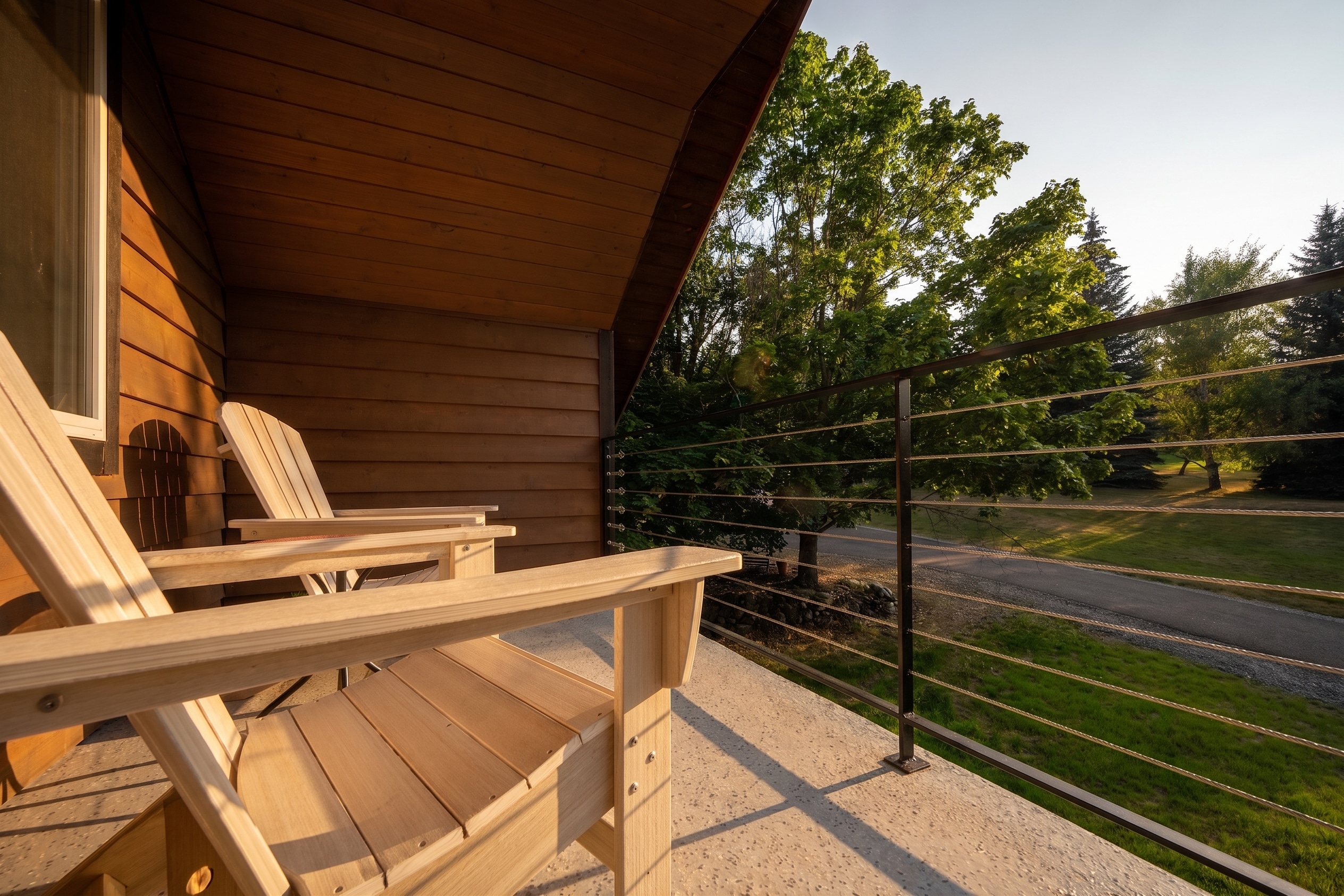 ADU balcony view with Adirondack chairs